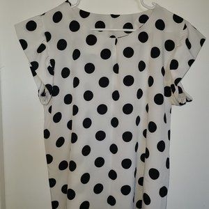 White polka dot blouse with ruffled sleeves